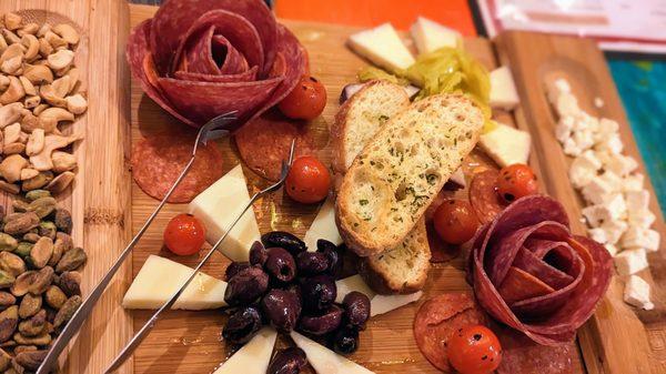 The charcuterie board is a great blend of meats, cheeses and olives. Their tamponade is beyond delish.