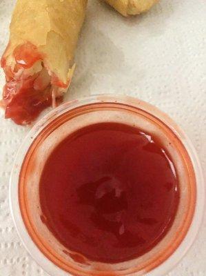 red dipping sauce is very good it tastes like cherry or plum with a little bit of tangy I love this sauce with eggrolls