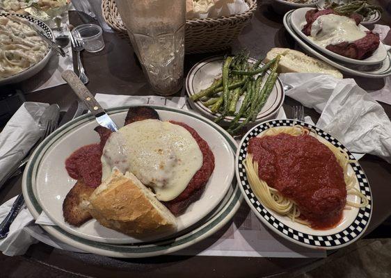 Chicken Parm with side of spaghetti and asparagus. Also came with fresh Italian bread and a large salad