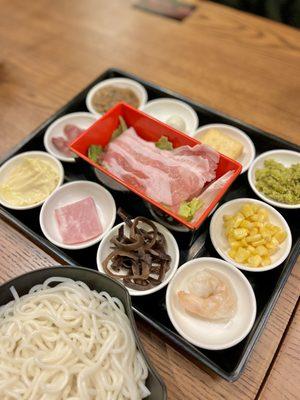 The platter - you dump these ingredients into the broth bowl