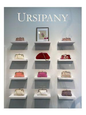 There is a whole wall of purses at Ursipany!