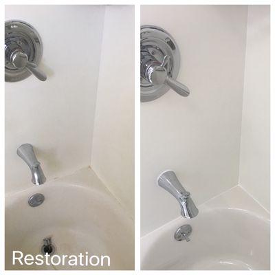 This was a steel tub and Corian walls we restored to near new condition using our no-spray process