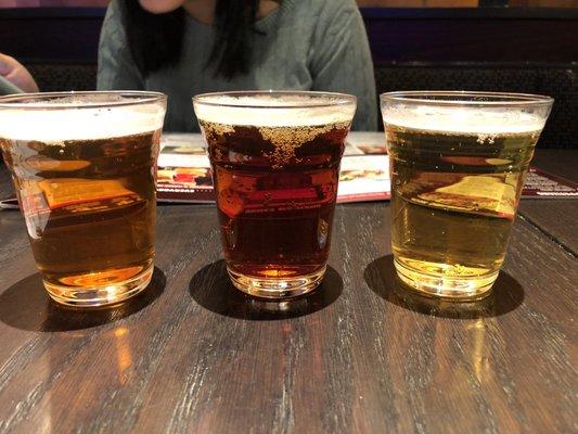 A "flight" of beers without the actual holder.