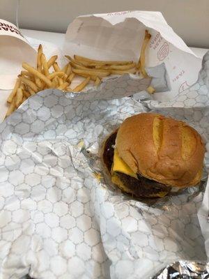 Double specialty burger (mushrooms) with fries.