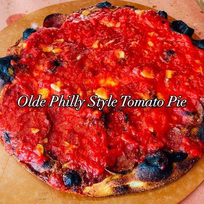 Experience the authentic taste of Philadelphia with our Olde Philly-Style Tomato Pie.