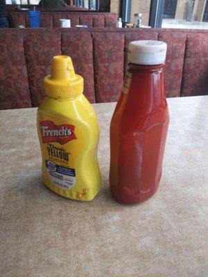 Totally dirty condiment bottles.