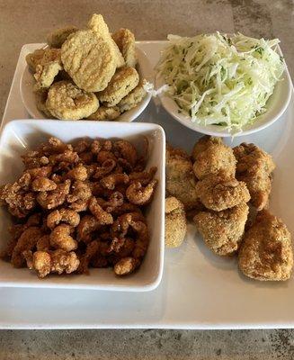 Fried oysters, crawfish, pickles and Greek feta slaw