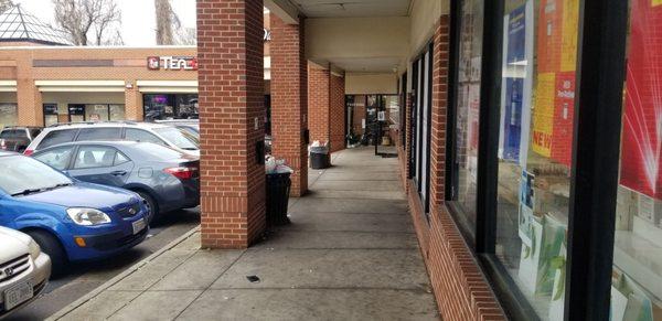 Trash cans need immediate attention. This photo doesn't show how bad the shopping center is, but its something.