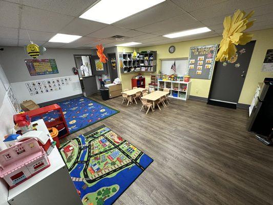 Our two year olds have plenty to do in this room, where they will play and learn.