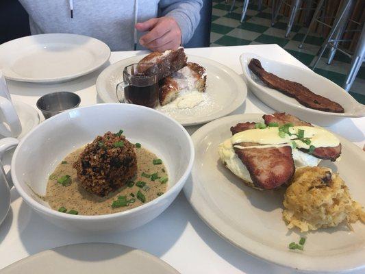 Cheeky monkey, fried French toast, eggs Benedict and slab of bacon