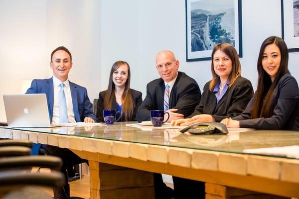 Fernandez & Karney team of attorneys. From left to right:Steven Fernandez, Helene Nordon, Mark Karney, Crystal Boultinghouse, Jean Young Kim