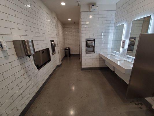 Clean bathroom, new floor, sink/mirror back-lit option, hand towel and auto handdry and baby changer...smart