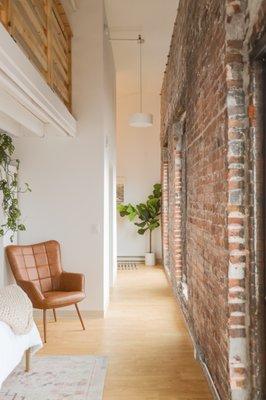 Some of our hotels units have extra high ceilings with a lofted area above the bed.