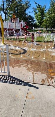 St. Clair Shores Memorial Park New Splash Pad (just a peek of it) with playground in background. Photo from September 2023.