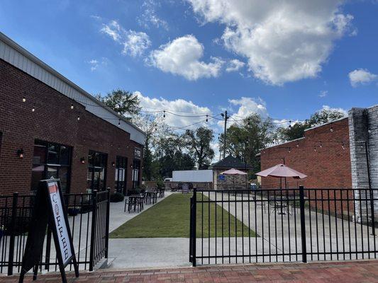 Where you enter to walk down to the coffee shop/ it's outdoor space.