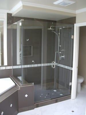 Custom shower enclosure by Glass Works.