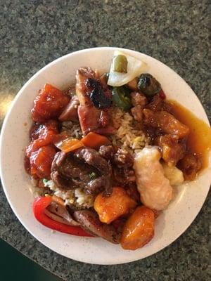 My yummy plate. Honey chicken,bourbon chicken,coconut chicken,beef w/o the broccoli and spicy chicken.