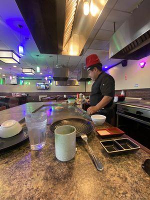 Our chef prepping the grill!