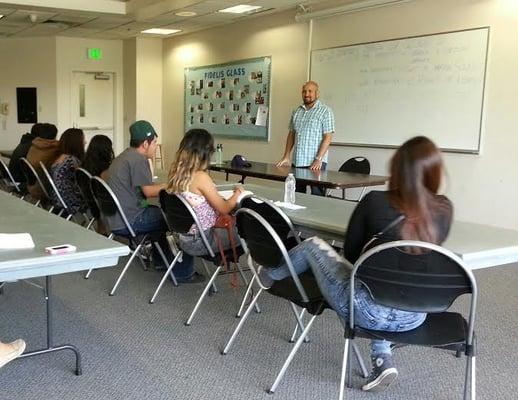 Tarek Shawky conducting a "Know Your Rights" workshop for youth at Skillz Pasadena