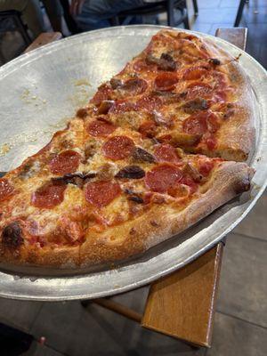 Large pizza with pepperoni and fried eggplant