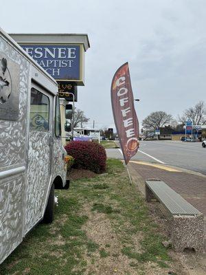 Side view of the Wandering Bean coffee truck.