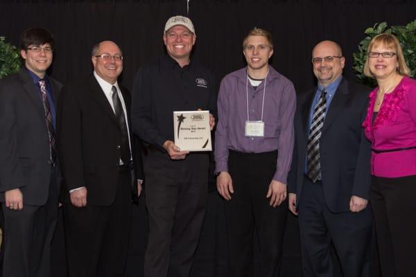 Here we are getting an award from the greatest manufacturer in the roofing business