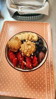 Acai bowl with peanut butter scoops