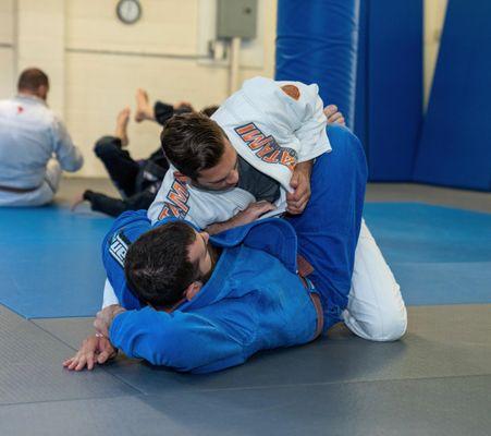 Chris training an attack from guard