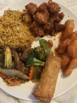 General Tso Chicken, Sweet & Sour Chicken, Szechuan Beef, Egg Roll, and Fried Rice.