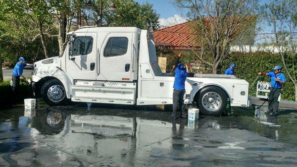 Our hard working team hand washing this truck - a typical day at Agoura Hills Hand Car Wash!