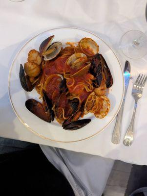 Pasta with mussels, clams & scallops with tomato sauce