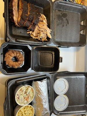 Pulled pork, 1/4 rack, churro donut, slaw, Mac n cheese, and burnt end burrito (unopened but looked every bit like advertised!)