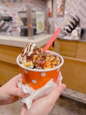 Frozen yogurt with Oreo cookie, captain crunch (free), and Nutella.