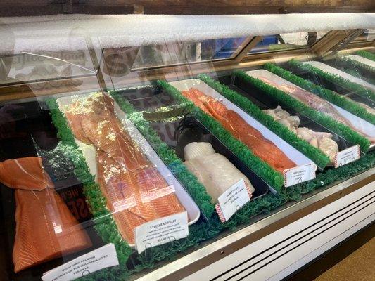 Deli case with fresh and in season seafood. Many varieties of fresh fish are locally sourced from a few hours away.