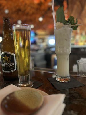 Lychee coconut cocktail and sapporo beer