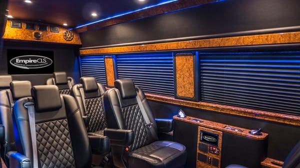 Mercedes-Benz Executive Sprinter vans feature over 6' of headroom, Bentley-stitched captain's chairs, flat-screen TVs and more.