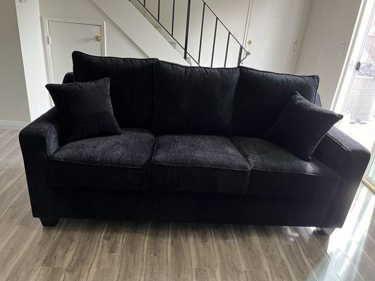 Black higher leg queen sofa bed with beautiful stitched pillows