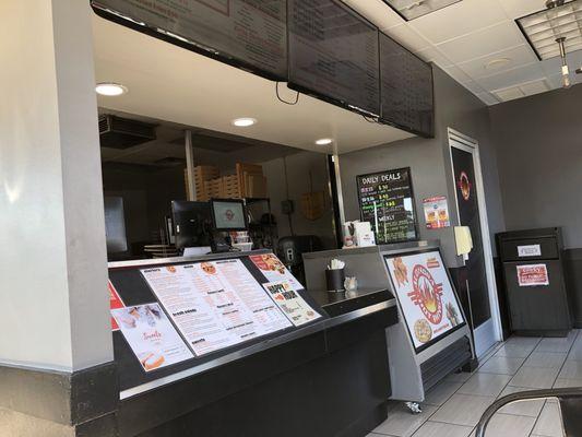 The ordering counter with kitchen behind it