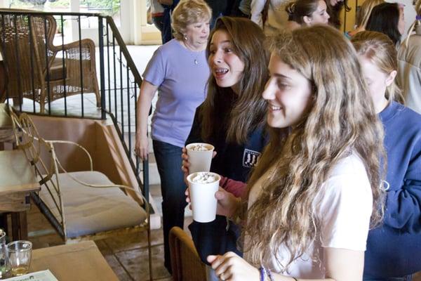 Talking to fans after a concert at Blue Canoe during the Ancora retreat in Anchor Bay, CA