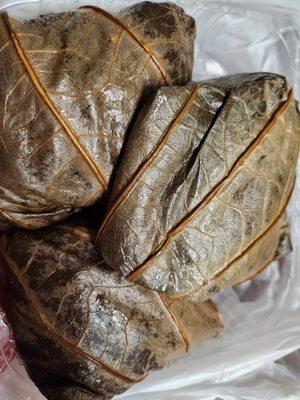 $5.80 each pork/Chinese sausage sticky rice wraps in lotus leaf