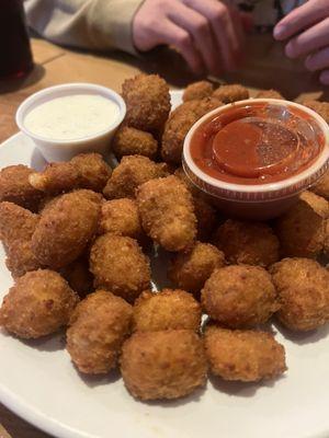 Cheese curds are freshly made and come plain or spicy! We tried both.