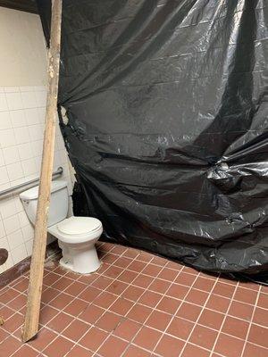 employees tried to cover the wall with garbage bags to hide that the wall is rotten from water damage. Like what the hell?