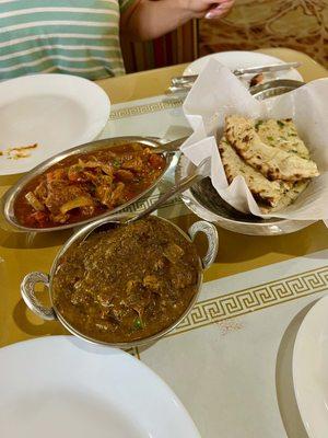 Top is Lamb Bhuna -  Bottom is Karahai Lamb Palak! And Garlic Naan I