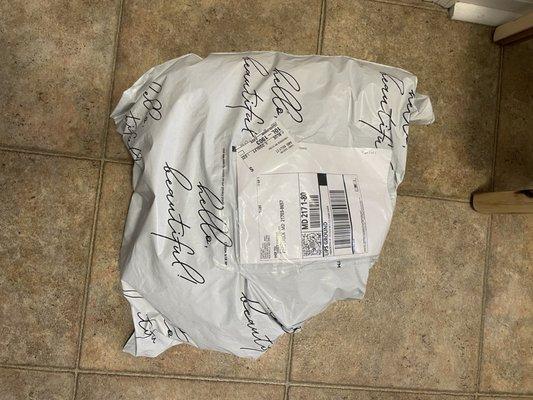 $150 dress just thrown in this thin polymailer.