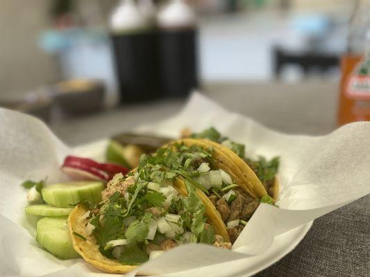 Kearny, Asada tacos and chicken tacos with rice and beans .