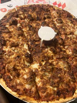 Overcooked sausage pizza