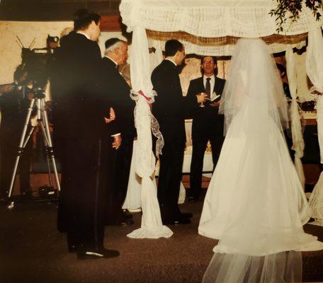 Rabbi Andrew Straus officiating a wedding at Temple Emanuel in May, 1999.