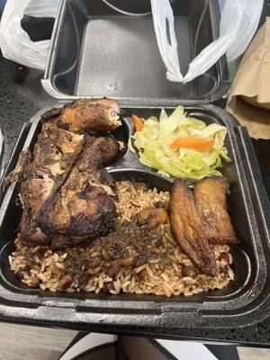 Jerk chicken meal comes with rice, cabbage and plantains. Gravy on rice.