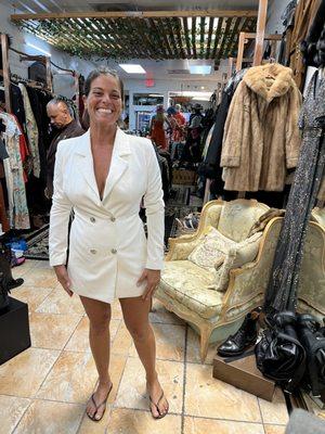 Happy Clients having fun trying on some of are fabulous fashions .