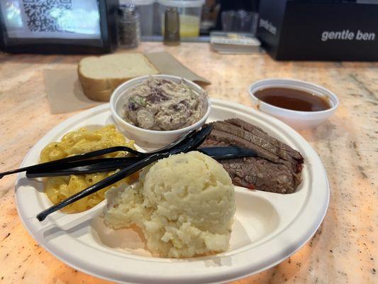 Two meat plate. Brisket. Chicken salad. Mac n cheese. Potato salad.